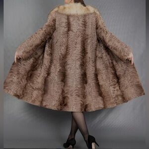 GENUINE PERSIAN BROADTAIL FUR COAT WITH FOX COLLAR.